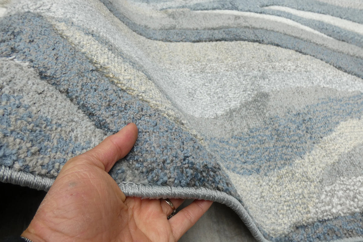 Kimya Collection Abstract Wave Rug in Navy and Neutral Tones – Fluid Contemporary Design