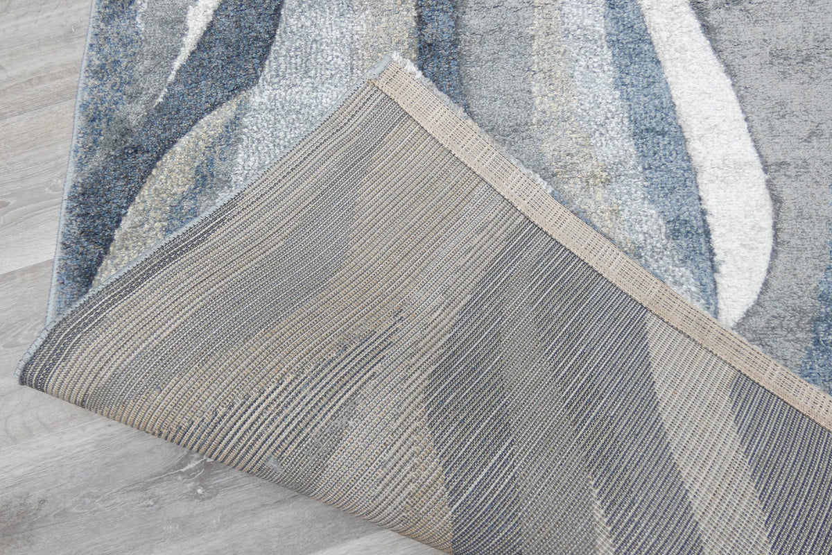 Kimya Collection Abstract Wave Rug in Navy and Neutral Tones – Fluid Contemporary Design