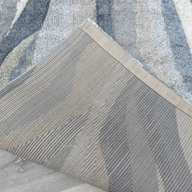Kimya Collection Abstract Wave Rug in Navy and Neutral Tones – Fluid Contemporary Design