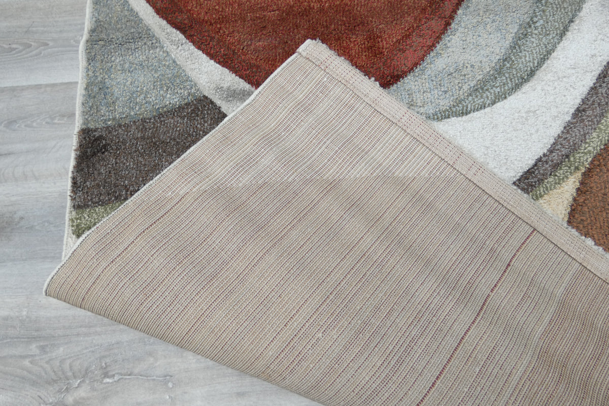 Kimya Collection Retro Wave Rug in Earthy Tones – Bold and Flowing Design
